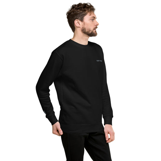 male model wearing black HOOVZ Quiet Power sweatshirt modern streetwear outfit
